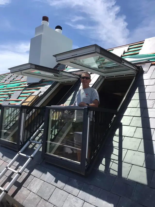 One of The Dixons team in a newly fitted VELUX Cabrio balcony